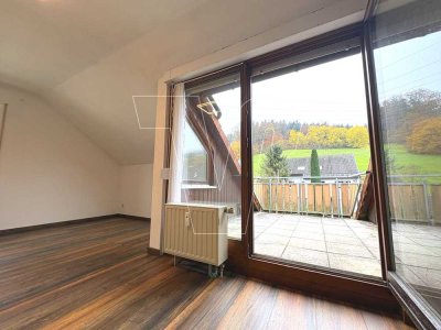 Gepflegte 3-Zimmer-Dachgeschosswohnung mit Stellplatz und Südbalkon