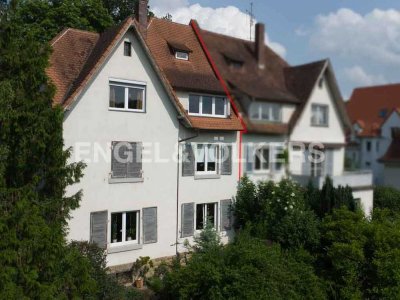 Vermietete Doppelhaushälfte mit ergänzendem Baugrundstück und großem Gestaltungspotenzial in gefr...