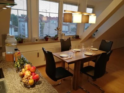 Helle und offene 2-Zimmer Wohnung in Maxvorstadt mit Dachterrasse und Alpenblick