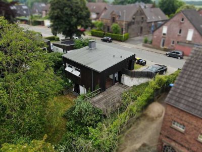 Zeitlose Eleganz am See – Bungalow mit Weitblick auf großem Grundstück