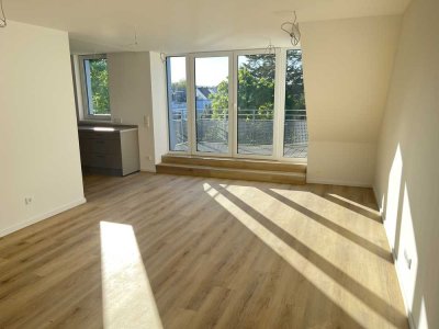 Neubau!  Sonnige 3-Zi-Wohnung mit Einbauküche + Dachterrasse