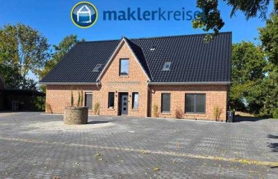 Kurz vor Fertigstellung! Ebenerdige Neubauwohnung mit Terrasse und Carport