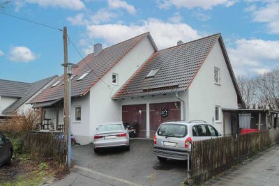 Zweifamilienhaus mit Potenzial, viel Nutzfläche und Garten in naturhafter Lage in Feldmoching!