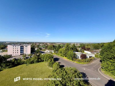 Großzügige und lichtdurchflutete Drei-/Vier-Zimmer-Wohnung mit Balkon und TG-Stellplatz