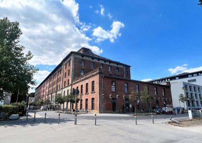 2-Zimmer-Wohnung auf der ERBA-Insel:  kpl. möblierte Erdgeschoß-Wohnung mit Terrassenanteil