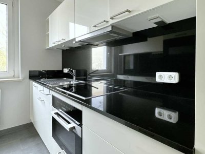 Hochwertig sanierte 2-Zimmer-Wohnung mit Südbalkon & exklusiver Einbauküche