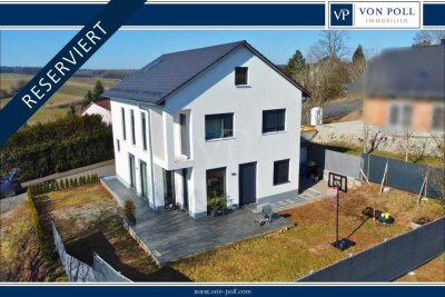 **RESERVIERT** Moderne Architektur trifft ländliche Idylle: Ihr neues Zuhause im Grünen