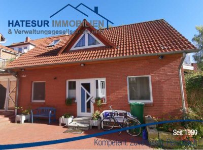 Charmante Maisonette-Wohnung mit Dachterrasse, Balkon und Garten zu vermieten