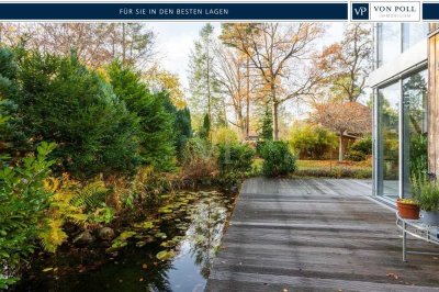 Lichtdurchflutetes Einfamilienhaus mit Gartenparadies und Kaminwärme