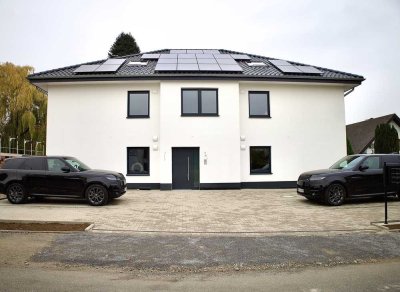 Exklusive 4-Zimmer Neubauwohnung im Maisonettenstil nach KfW 40ee Standard in Löhne mit Balkon