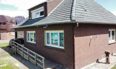 "Wohnen mit Aussicht – familienfreundliches Haus in Rhauderfehn mit freiem Blick auf Wiesen und Feld