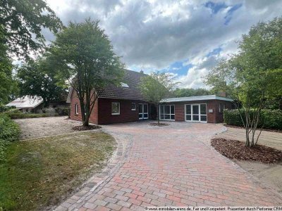 gepfl. Wohnhaus mit Carport und Garten mit sep. Gewerbe-/Wohnraum in Westerstede - Hollwege