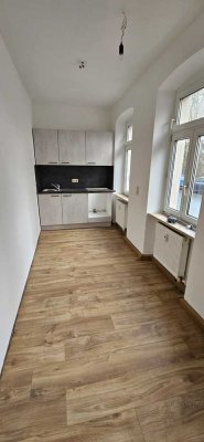 Renovierte 1 Zimmer Wohnung mit kleiner Einbauküche