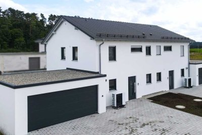 Erstbezug • Energieeffizienzhaus KfW 55 in familienfreundlicher Wohnlage direkt am Ortsrand