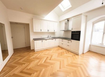 Exklusives Wohnen im historischen Dalberger Hof – 2,5-Zimmer-Maisonette in Mainz.