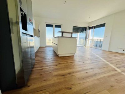 Wohntraum mit Seeblick, Balkon, EBK u. Tiefgaragenstellplatz: 4-Zimmer-Wohnung direkt am See am Kap!