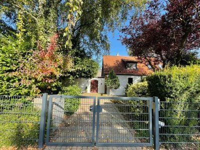 Doppelhaushälfte in Düsseldorf-Vennhausen mit Garten und Wintergarten