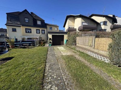 Gemütliches Einfamilienhaus mit Garten, überdachter Terrasse und Garage im Zentrum von Altenkirchen.