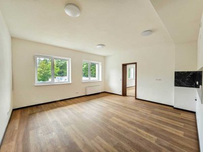 Wohnen im Grünen: Kernsanierte 2-Zimmer-Oase für Ruhesuchende