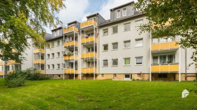 Attraktiv & gemütlich: Ruhig und grün gelegene DG-Wohnung mit Südbalkon und PKW-Stellplatz