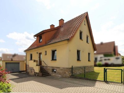 Einfamilienhaus mit Garage und Gartenidylle in Flieden