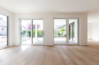 Neubau Erstbezug. Gartenwohnung mit Terrasse und Tiefgaragenstellplatz