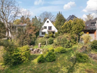 Großzügiges Einfamilienhaus auf parkähnlichem Anwesen inklusive Baugrundstück