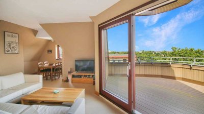 Lichtdurchflutete Dachgeschosswohnung mit großer Terrasse in zentraler Lage