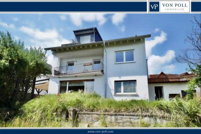 Zweifamilienhaus mit großem Garten in Ober-Rosbach