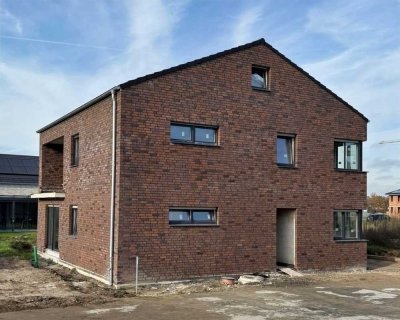 Erstbezug! Hochwertige 3-Zimmer-Wohnung im Erdgeschoss mit Terrasse, Garten und Garage in Olfen