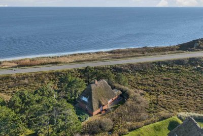Freistehendes Einzelhaus unter Reet auf Erbpacht-Grundstück in der Westerheide mit Meerblick