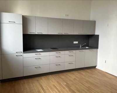 ERSTBEZUG! Lichtdurchflutetes Apartment mit großzügiger Einbauküche