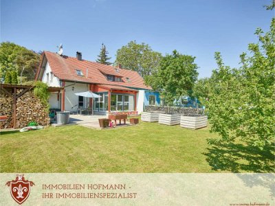 Charmante Doppelhaushälfte mit großem Garten und viel Potential in Wallersdorf zu Verkaufen