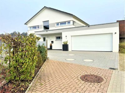 Exklusives, energieeffizientes Wohngebäude mit großzügigem Grundstück in bevorzugter Wohnlage