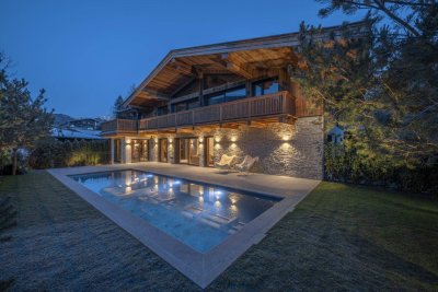 "Wiesenlodge": einzigartige Garten-Maisonette-Wohnung mit privatem Pool