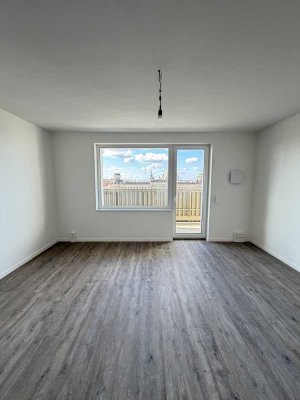 Lichtdurchflutete 2,5-Zimmer-Wohnung im Erstbezug: Einbauküche und Balkon