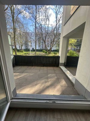 Moderne 2-Zimmer-Erdgeschosswohnung mit großer Terrasse und Blick ins Grüne