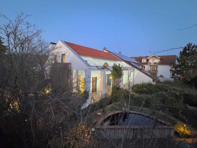 Ihr neues Zuhause: Hochwertiges Einfamilienhaus mit Einliegerwohnung in Top Lage