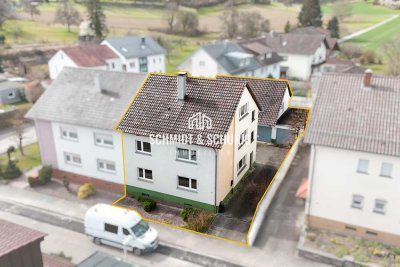 Zweifamilienhaus mit Schuppen und Dachausbau-Potenzial in Obergrombach