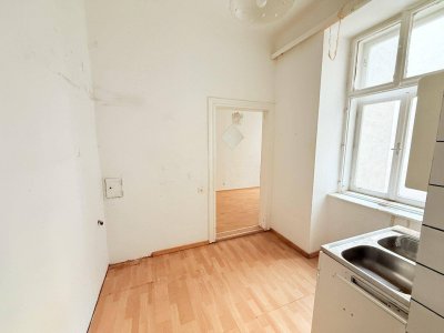 Urbanes Wohnen mit Top-Anbindung – Garçonnière in gepflegtem Altbau