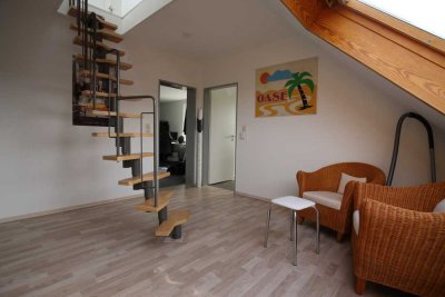 Freundliche und modernisierte 4-Raum-OG/DG-Wohnung mit EBK in Drakenburg