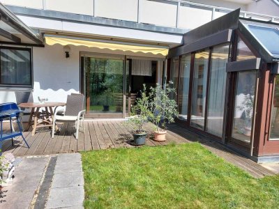 Großzügige Terrassenwohnung mit Wintergarten und Garage