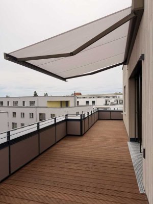 Erstbezug: Helle Dachgeschosswohnung mit großer Terrasse - Nachhaltiges Wohnen am Wasser