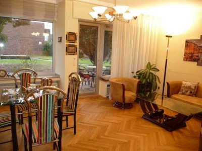 Exklusive 3-Zimmer-Wohnung mit Traumgarten und wohnlich ausgebautem Untergeschoss!