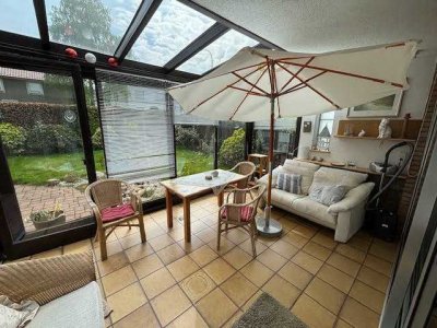 Charmantes Reihenendhaus mit Wintergarten, ausbaufähigem Dachgeschoss und großzügigem Keller