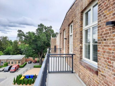 Luxuriöses und komfortables Wohnen im exklusiven Penthouse der historischen Hutfabrik