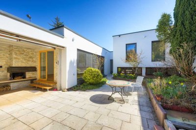 Design trifft Geborgenheit – Familienfreundlicher Bungalow mit Gartenidylle in ruhiger Lage