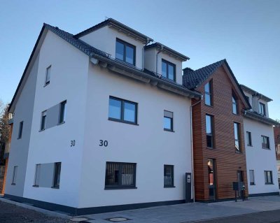 Attraktive Dachgeschosswohnung mit Balkon und EBK im Ortskern von Hosenfeld-Hainzell