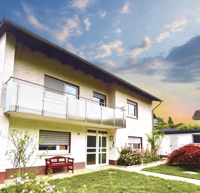Freistehendes Einfamilienhaus mit barrierefreier Einliegerwohnung und Garten