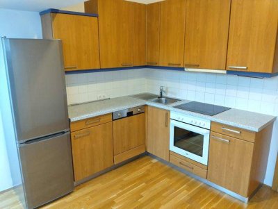 St. Leonhard: 2 ZIMMER-NEUBAU + sonniger Süd-Balkon + extra Wohnküche + Bad mit Wanne + WC + Lift!